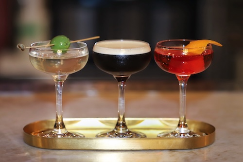 Cocktail flight with assorted drinks